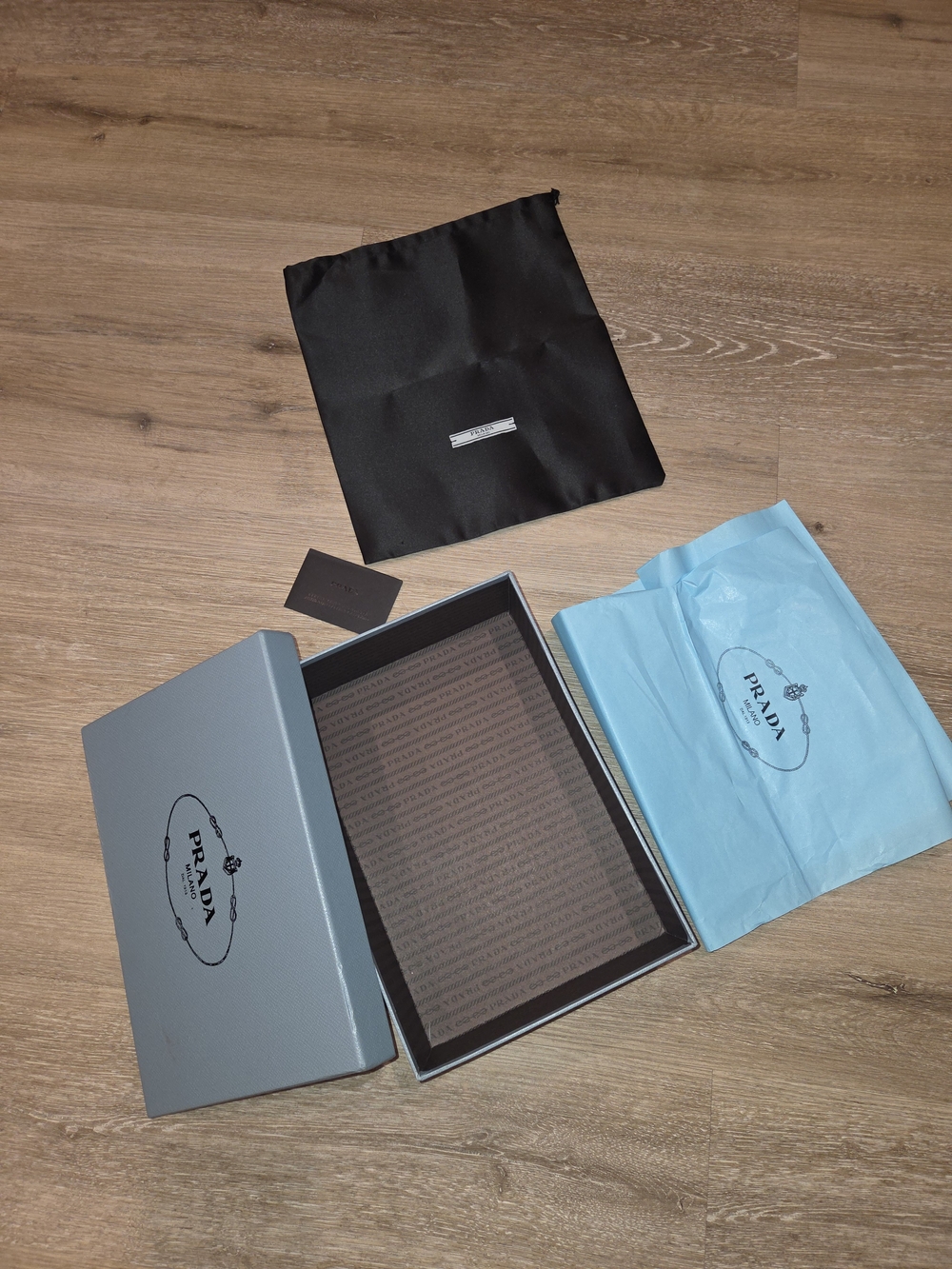 4pc Prada- Box, Tissue, Dust Bag And Booklet